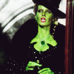 Wicked Witch Melting Selena With Big Jade Pendant GIF