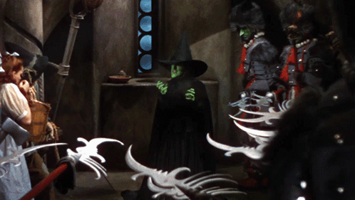 Wicked Witch Melting White Calligraphy GIF