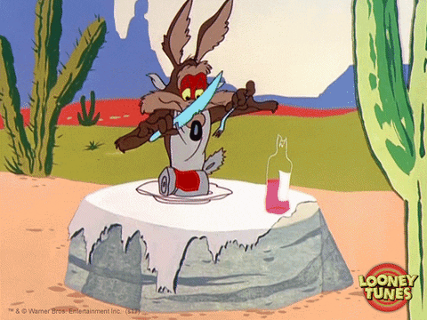 Wile E Coyote Eating Cans GIF