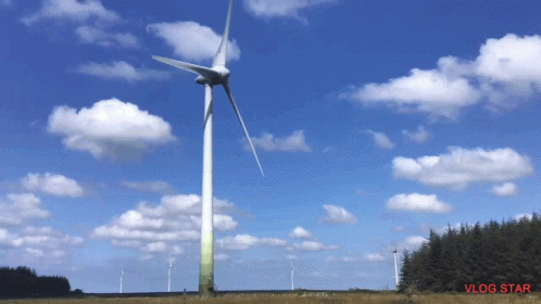 Wind Turbine In Field Saying Vlog Star GIF