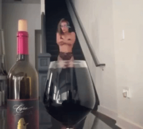 Wine Bottle and Glass with Woman