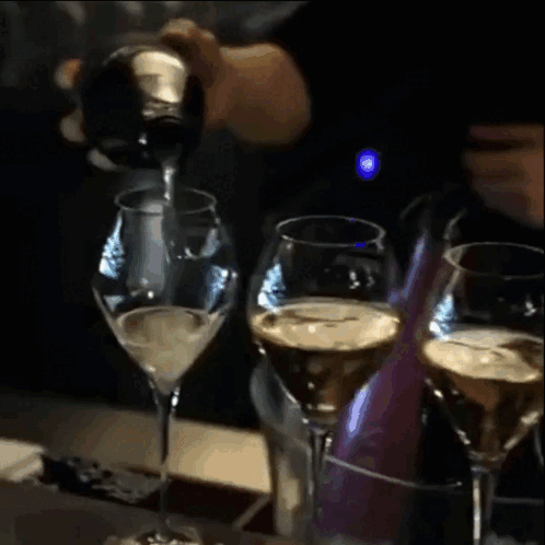 Wine Bottle Pouring Into IWill Glass