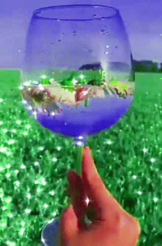 Wine Glass In Green Floral Background GIF
