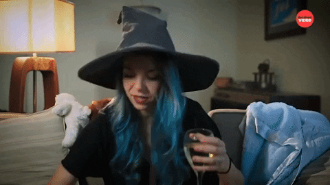 Wine Mom Wearing Sorting Hat GIF