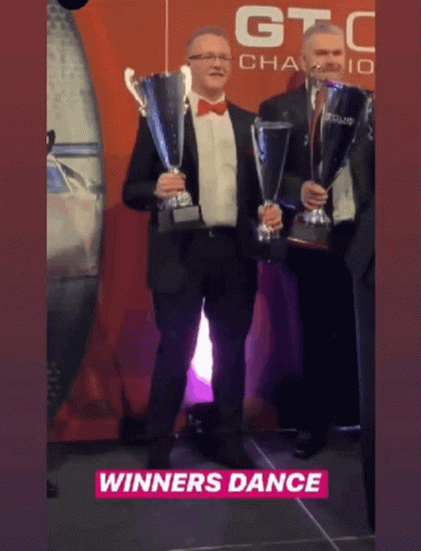 Winner Dance With Trophy GIF