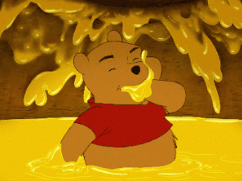 Winnie The Pooh Eating And Playing With Honey GIF