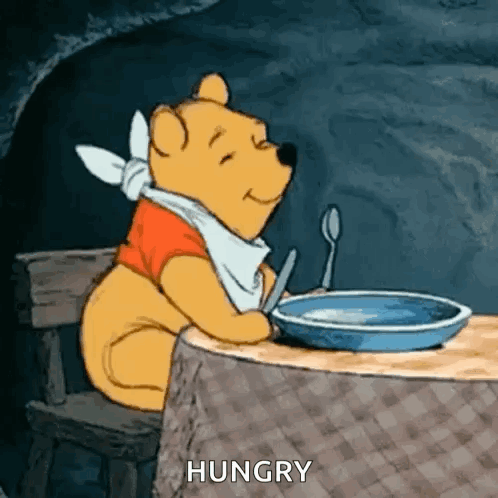 Winnie the Pooh Eating Food with Spoon