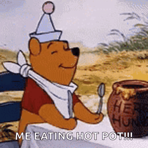 Winnie The Pooh Is Sitting At A Table Holding A Spoon And A Jar Of Honey . GIF