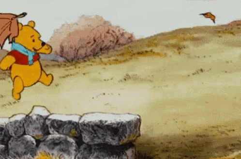 Winnie The Pooh Plays Falling Leaves GIF