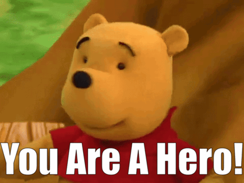 Winnie The Pooh Says " You Are A Hero " In Front Of A Green Background GIF