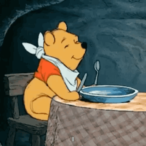 Winnie the Pooh Sitting at Table