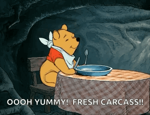 Winnie the Pooh Sitting at Table with Bowl of Soup
