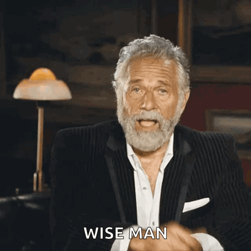 Wise Man Pointing at Camera