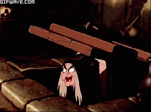 Witch Peeking From Under Table
