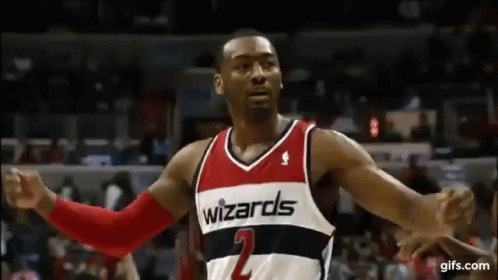 Wizards Basketball Player Arms Outstretched Before Crowd