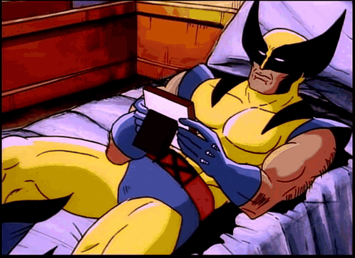 Wolverine Reading Book on Bed