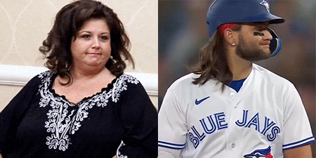Woman and Blue Jays Baseball Player Sitting Together