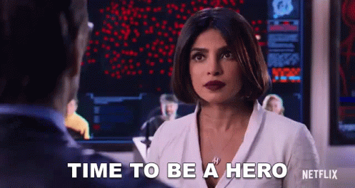 Woman and Man at Screen Saying Time to Be Hero