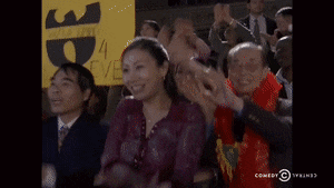 Woman Applauds Holding Ep Sign