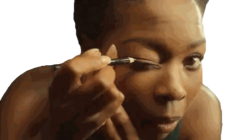 Woman Applying Eyeliner