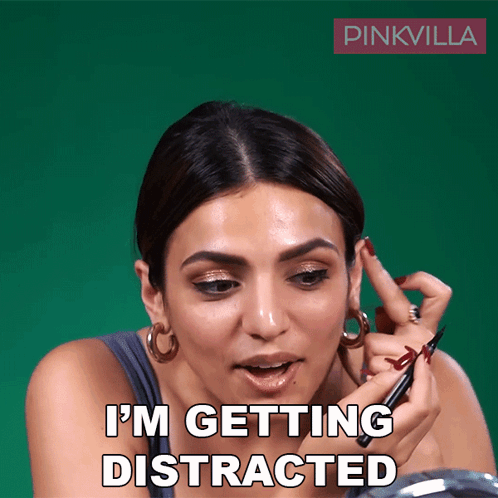 Woman Applying Makeup Saying I'm Getting Distracted
