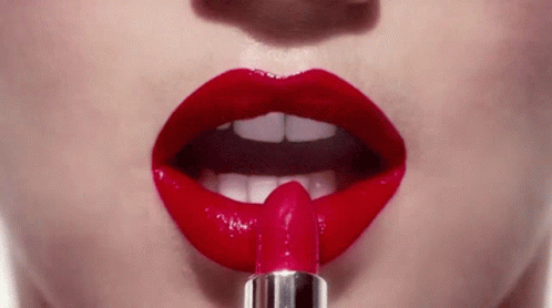 Woman Applying Red Lipstick GIF
