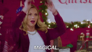 Woman Arms Up Saying Magical Christmas Tree GIF