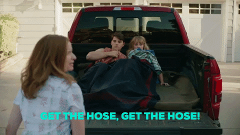 Woman Asking Husband To Get Fire Hose GIF