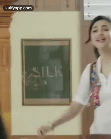 Woman at Chalkboard Saying Silk
