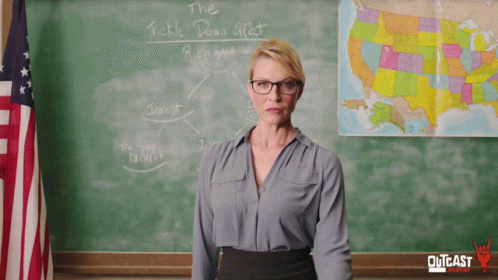 Woman at Chalkboard Saying The Tickle Down Effect