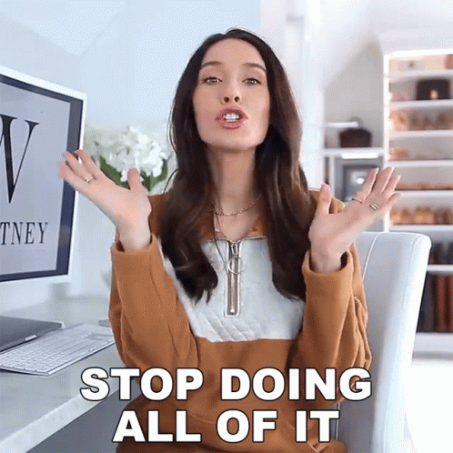 Woman at Computer Saying Stop Doing All of It