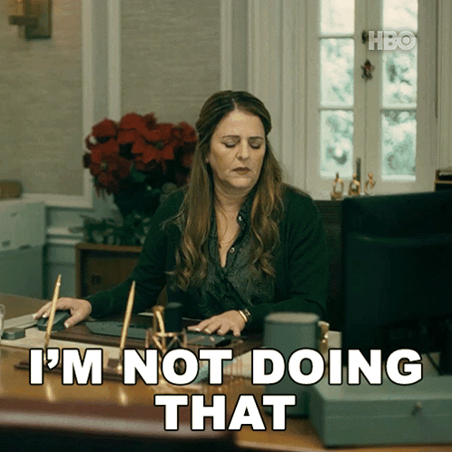 Woman at Desk Saying I'm Not Doing That