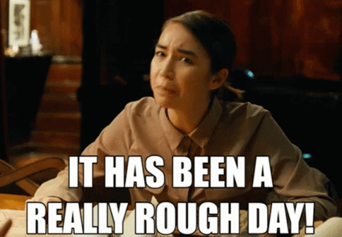 Woman at Desk Saying It Has Been a Really Rough Day