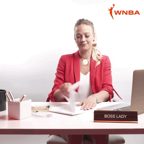 Woman at Desk With Boss Lady Sign