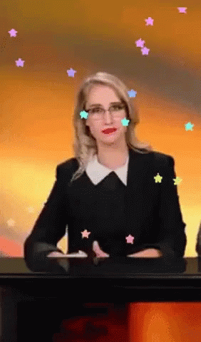 Woman at Desk With Stars Around Head