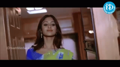 Woman at Door with Dreammedia.com Logo
