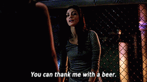 Woman at Fence Says You Can Thank Me With a Beer