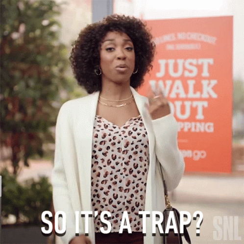 Woman at Just Walk Out Shopping Sign