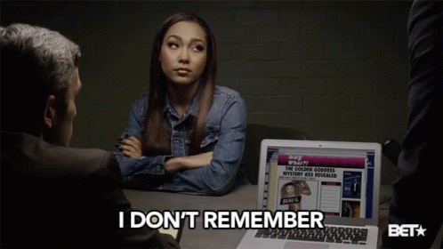 Woman At Laptop Saying I Don't Remember GIF