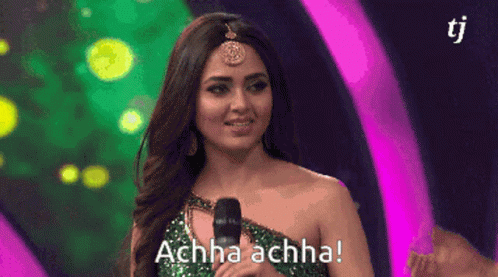 Woman at Microphone Saying Achha Achha