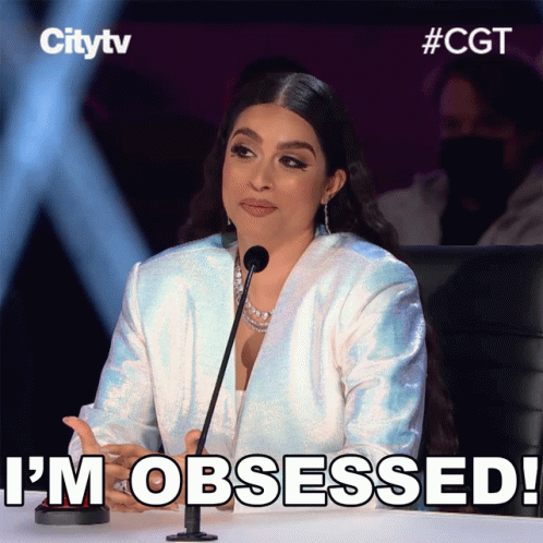 Woman at Microphone Saying I'm Obsessed