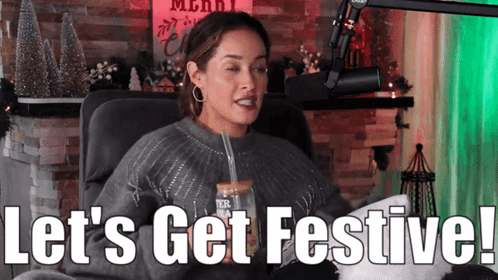 Woman At Microphone Saying Let's Get Festive GIF