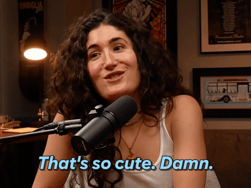 Woman at Microphone Saying That's So Cute Damn