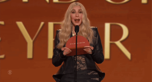 Woman at Microphone Saying YR