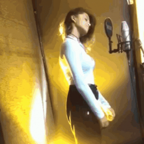 Woman at Microphone With Yamaha Logo