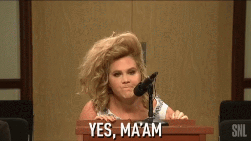 Woman At Podium Saying Yes GIF