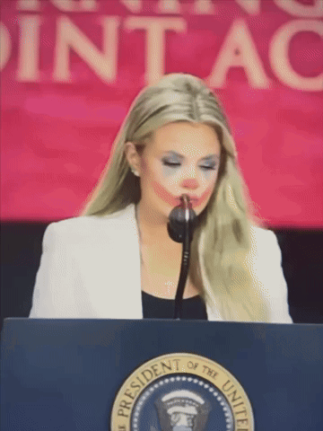 Woman At Presidential Podium GIF