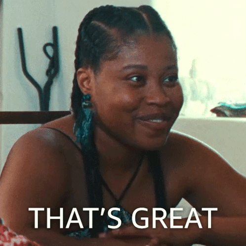Woman At Table Saying That's Great GIF