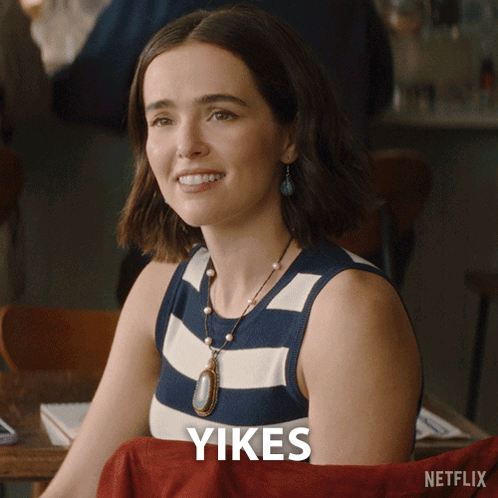 Woman at Table Saying Yikes