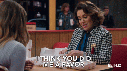 Woman at Table With Netflix Logo